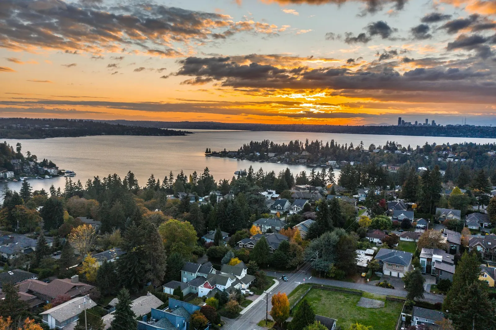 Aerial view of lakeside neighborhoods at sunset in South King County