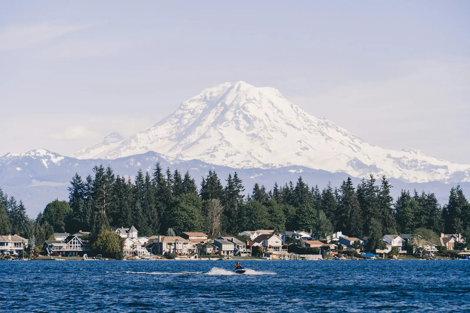 Mount Rainier above lakeside homes in the Puyallup valley