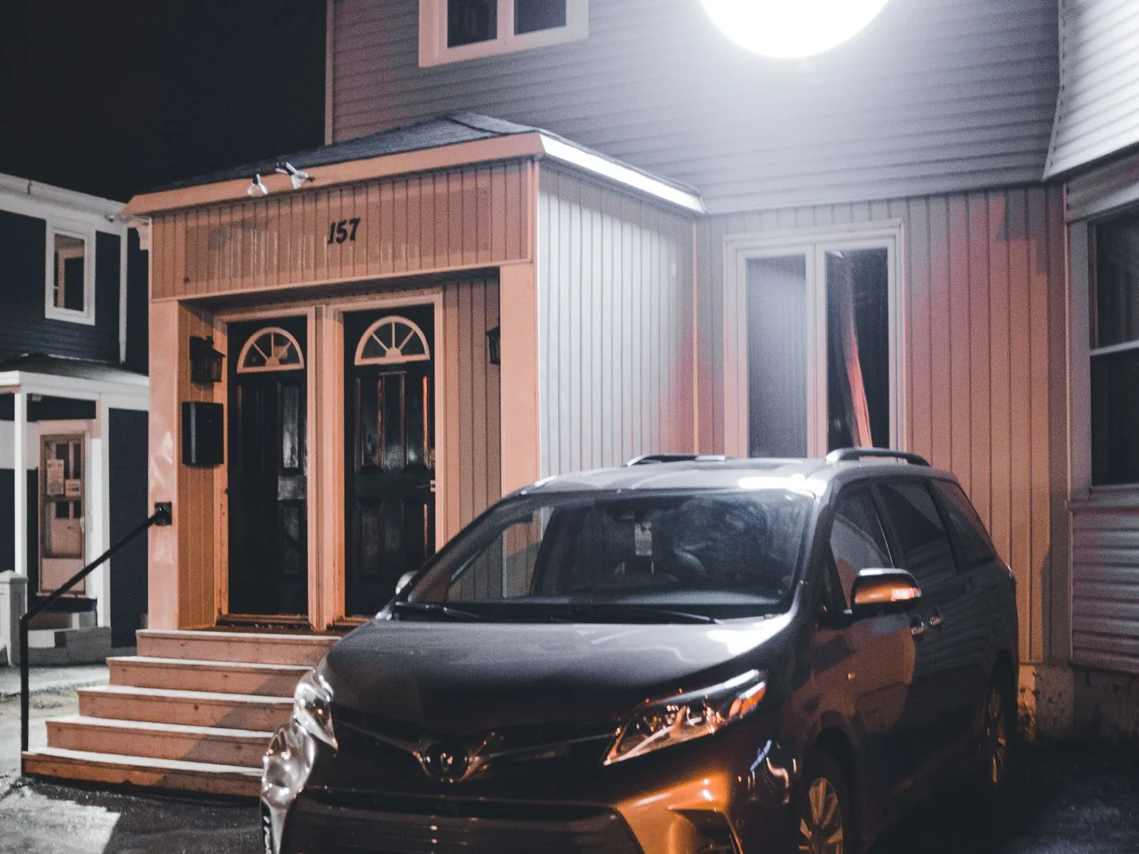 Technician arriving at a home at night for an urgent no-heat call