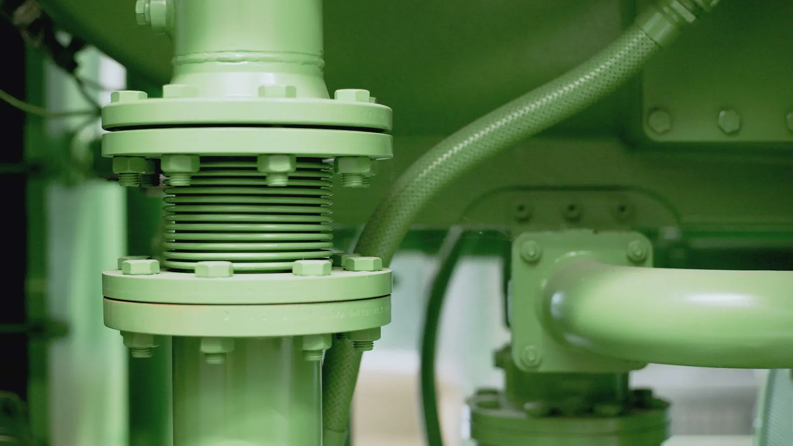 Precision pump and piping assembly on an industrial mechanical system